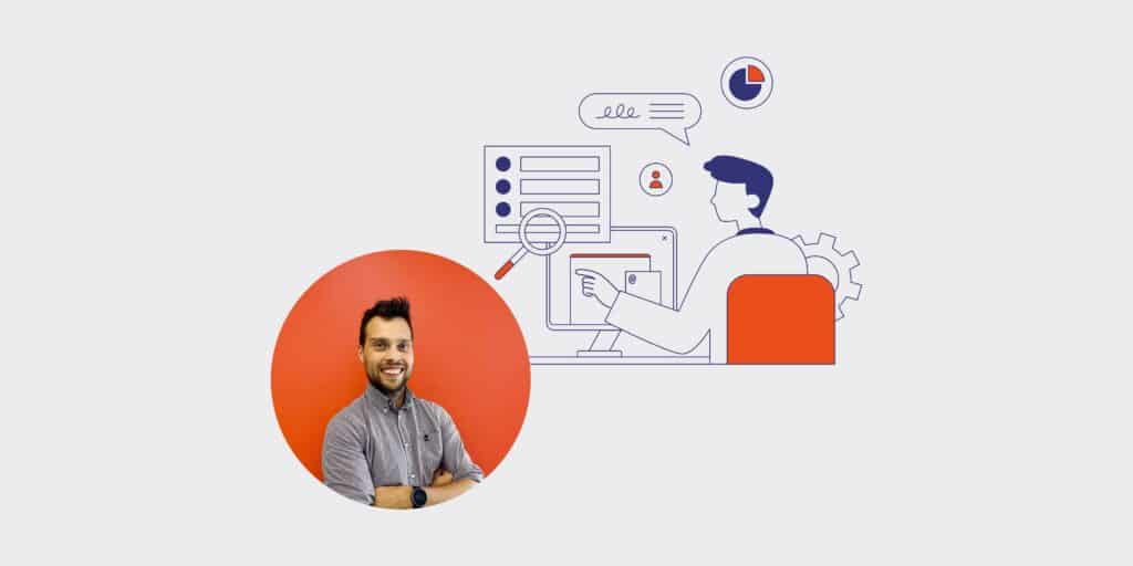 Smiling man in a gray shirt inside an orange circle beside a blue line-art illustration of a computer desk, magnifying glass, and data charts.