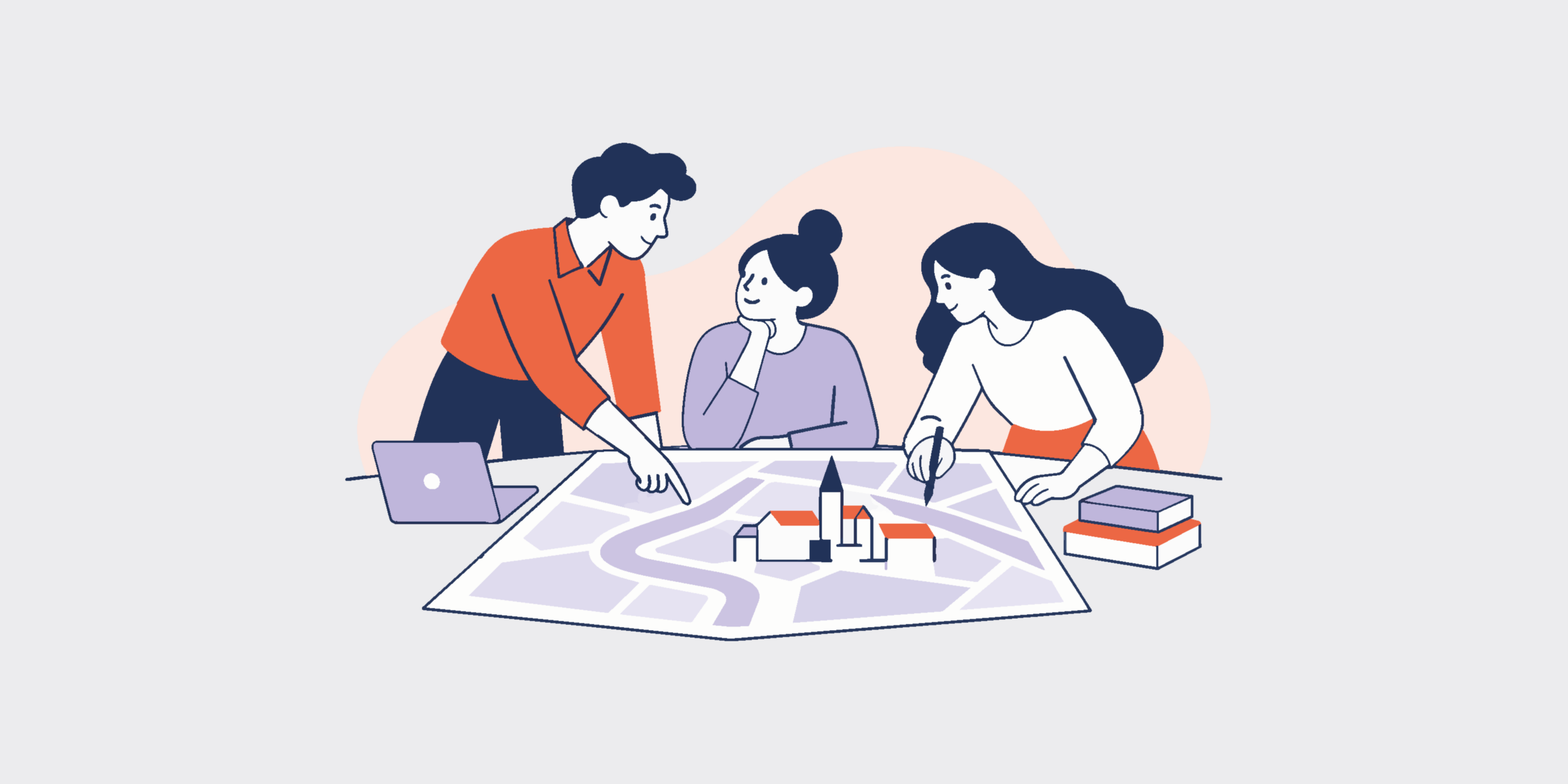 Three people collaborate around a large map plan, with a laptop and building blocks on the table.