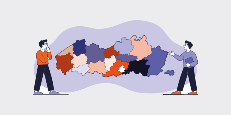 Two people stand on opposite sides of a color‑coded map of Austria’s states, discussing the regions.